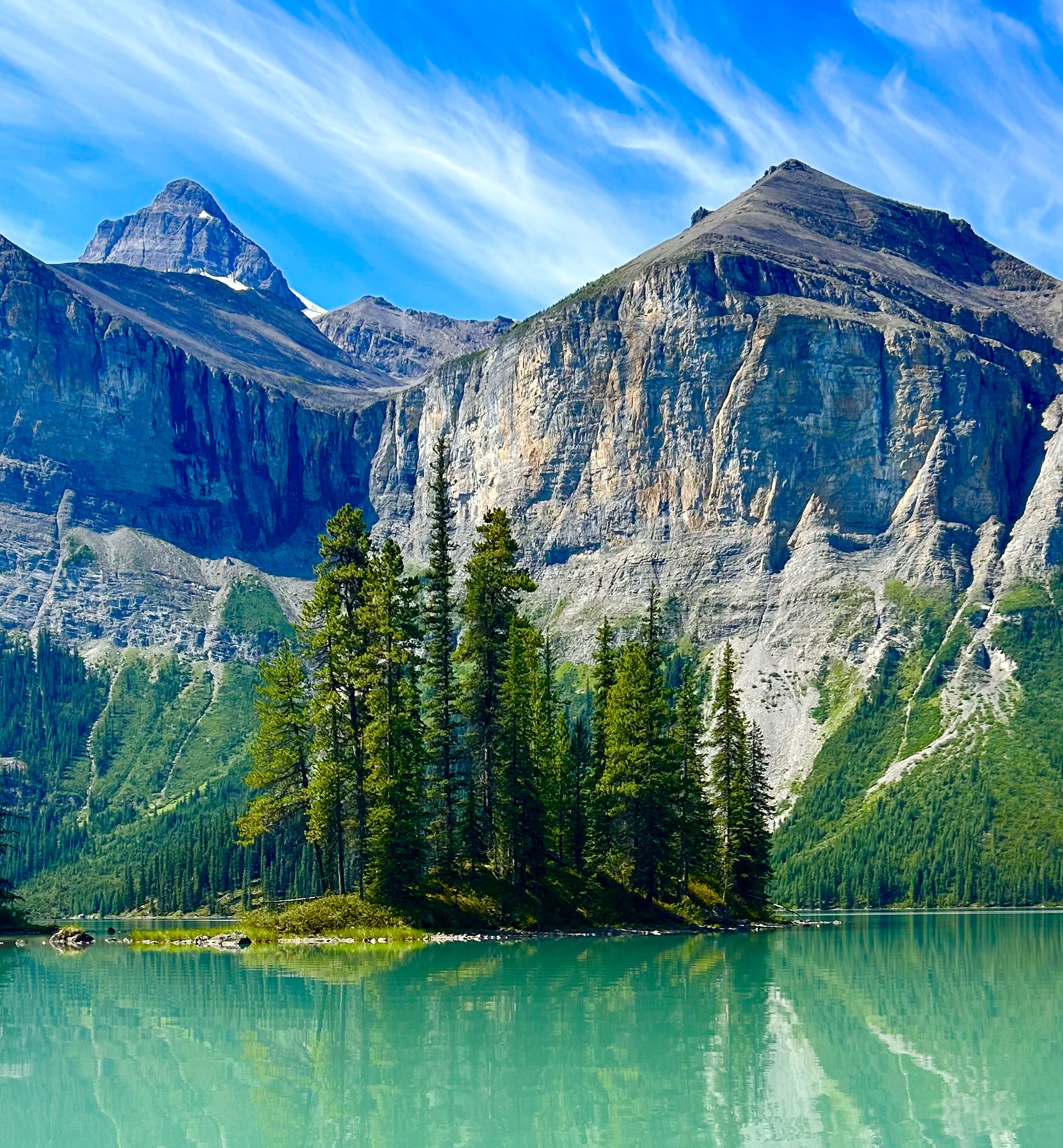 Currie's Island with dramatic mountain backdrop, Maligne Lake